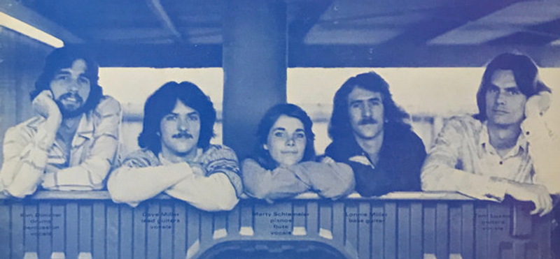 Vintage reel-to-reel tape recorder with analog audio reels